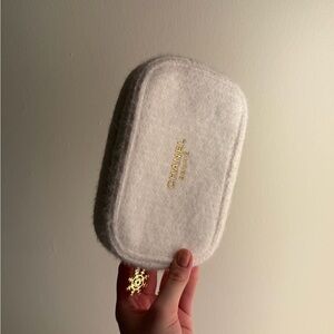 CHANEL Cream Pouch with Gold Accents